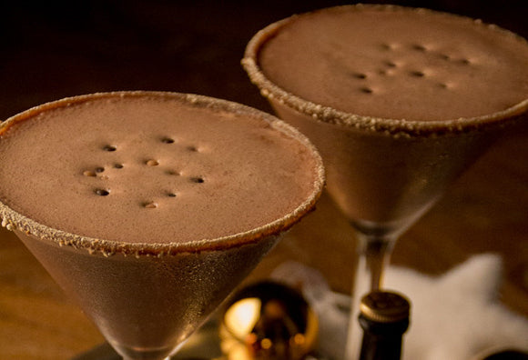 Chocolate, salted caramel Bailey's & vanilla vodka cocktail with powdered pretzel rim